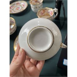 Coalport tea and coffee cups, pattern no. 830, decorated with sprays of flowers within gilt borders, comprising three teacups, four coffee cups and five saucers, with another matched teacup and saucer 