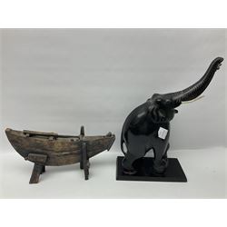 Carved ebonised elephant, together with a copper coffee pot and other collectables 
