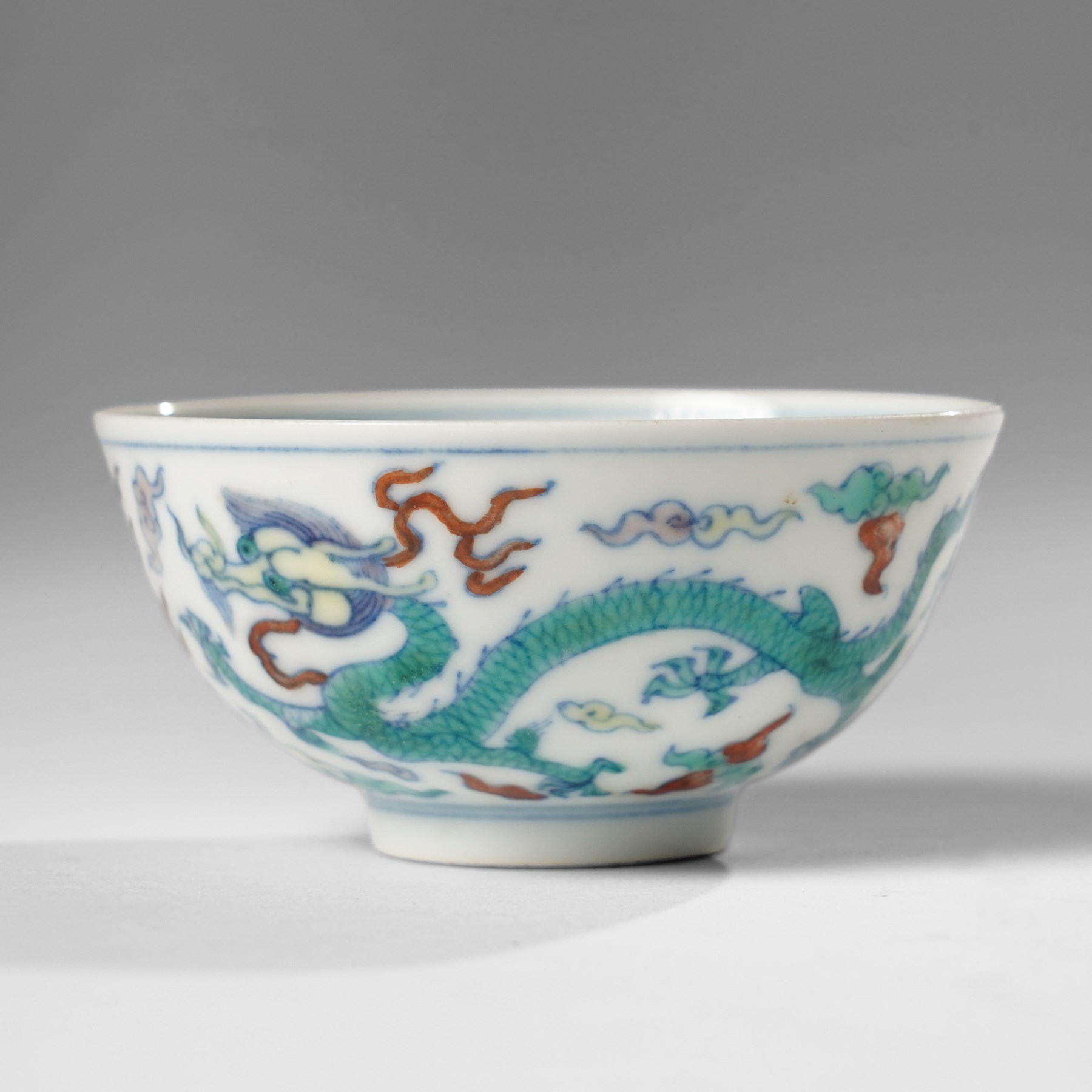 Chinese doucai wine cup, painted with a dragon, apocryphal six character Yongzheng mark to base, H3.5cm D7.5cm 