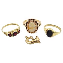 Gold three stone garnet ring, gold cameo ring, gold black onyx ring and a trumpet charm including cameo ring, all hallmarked 9ct