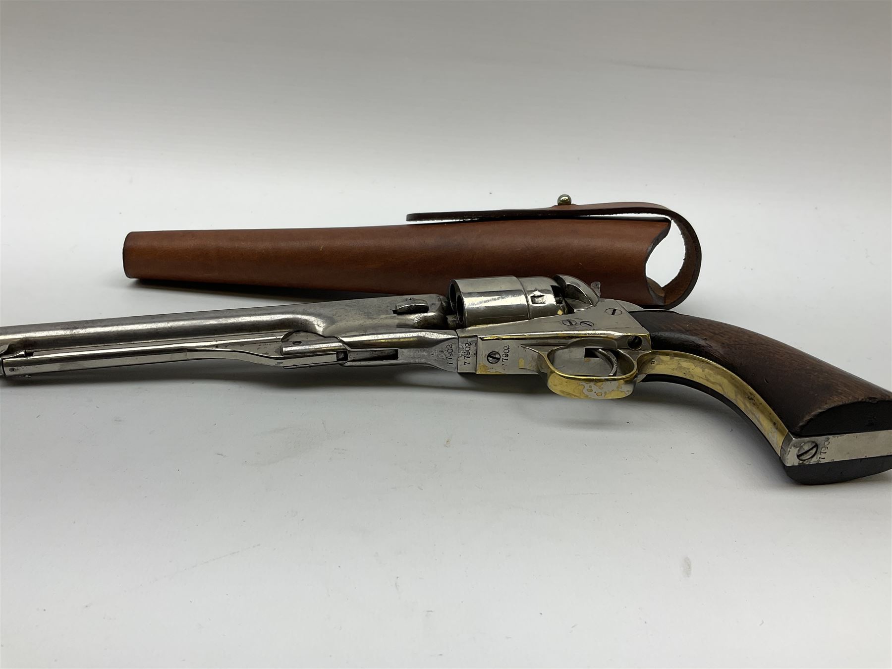 Colt model 1860 .44 calibre six-shot percussion army revolver with stepped cylinder, the 20.5cm barrel inscribed 'Address Col Saml Colt New York US America' with under barrel rammer, all parts with matching serial no.77902, traces of plating to brass trigger guard, two-piece walnut grips L37cm; with modern brass bullet maker and leather holster