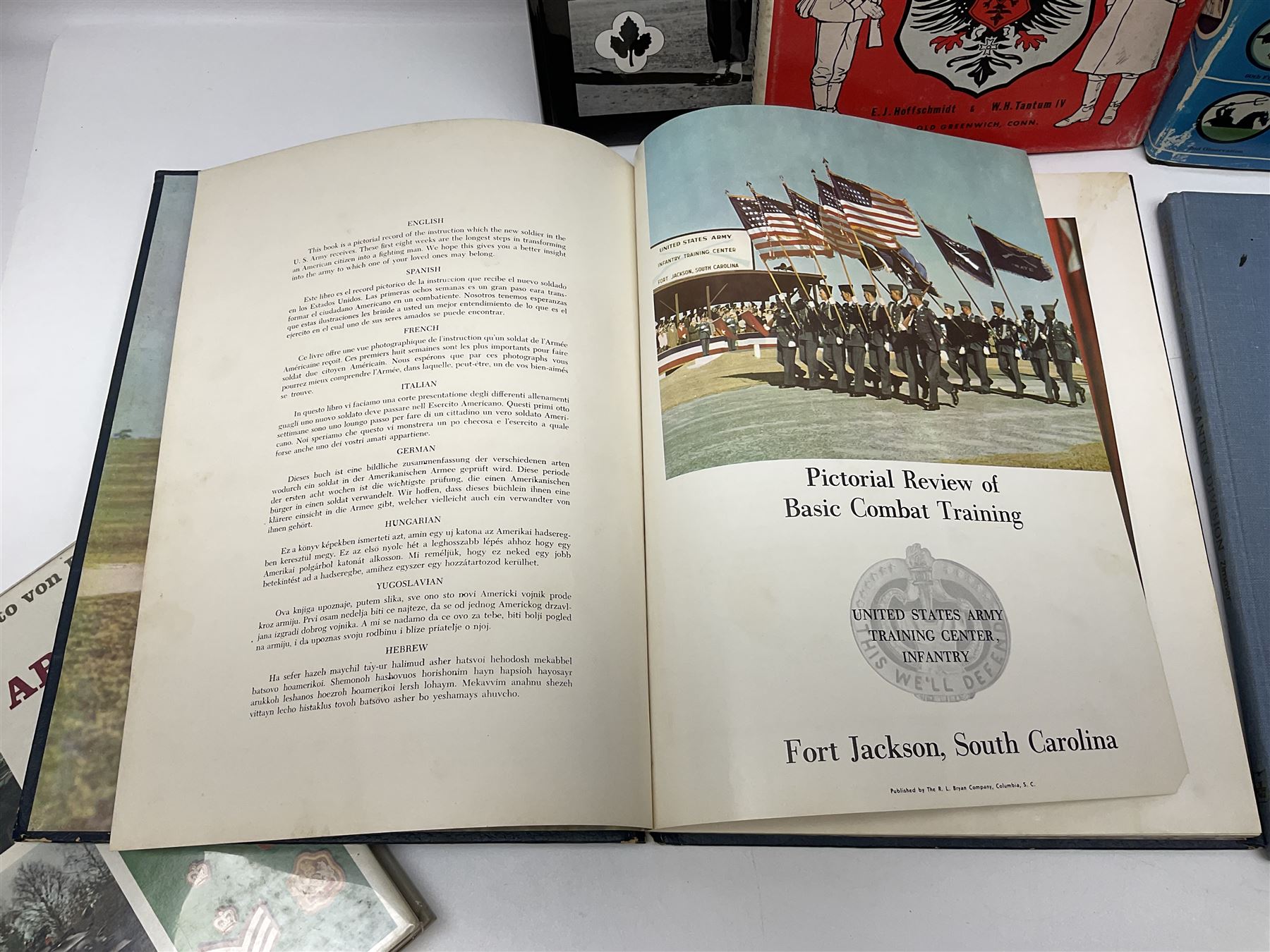 Four reference books of US Military interest comprising Basic Training US Army Training Center Infantry Fort Jackson, South Carolina; two books on the 43rd Infantry Division; and WW2 Combat Squadrons of the USAF; and three other books including German Army & Navy Uniforms and Insignia 1871-1918 (7)