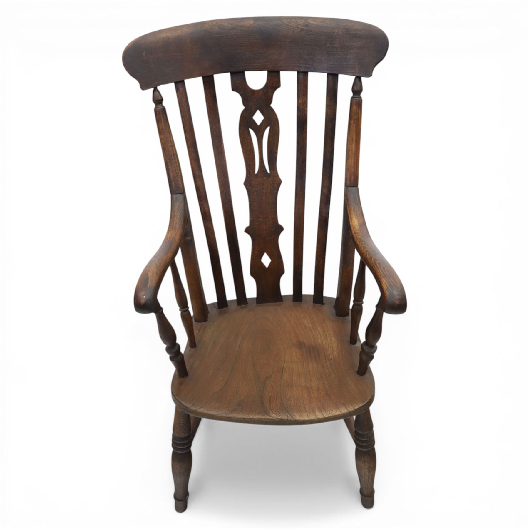 Traditional design elm farmhouse chair, a vase splat flanked by turned spindles, on turned supports united by a H stretcher