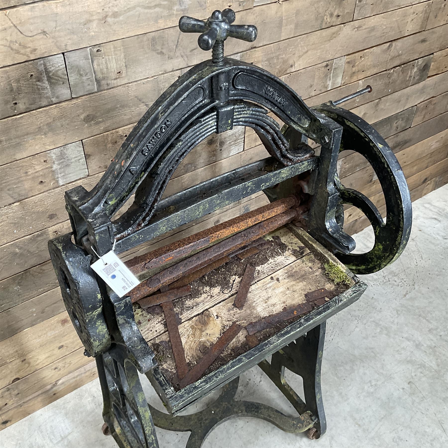 Ewbank cast iron ornamental mangle retailed by A Sawdon Whitby