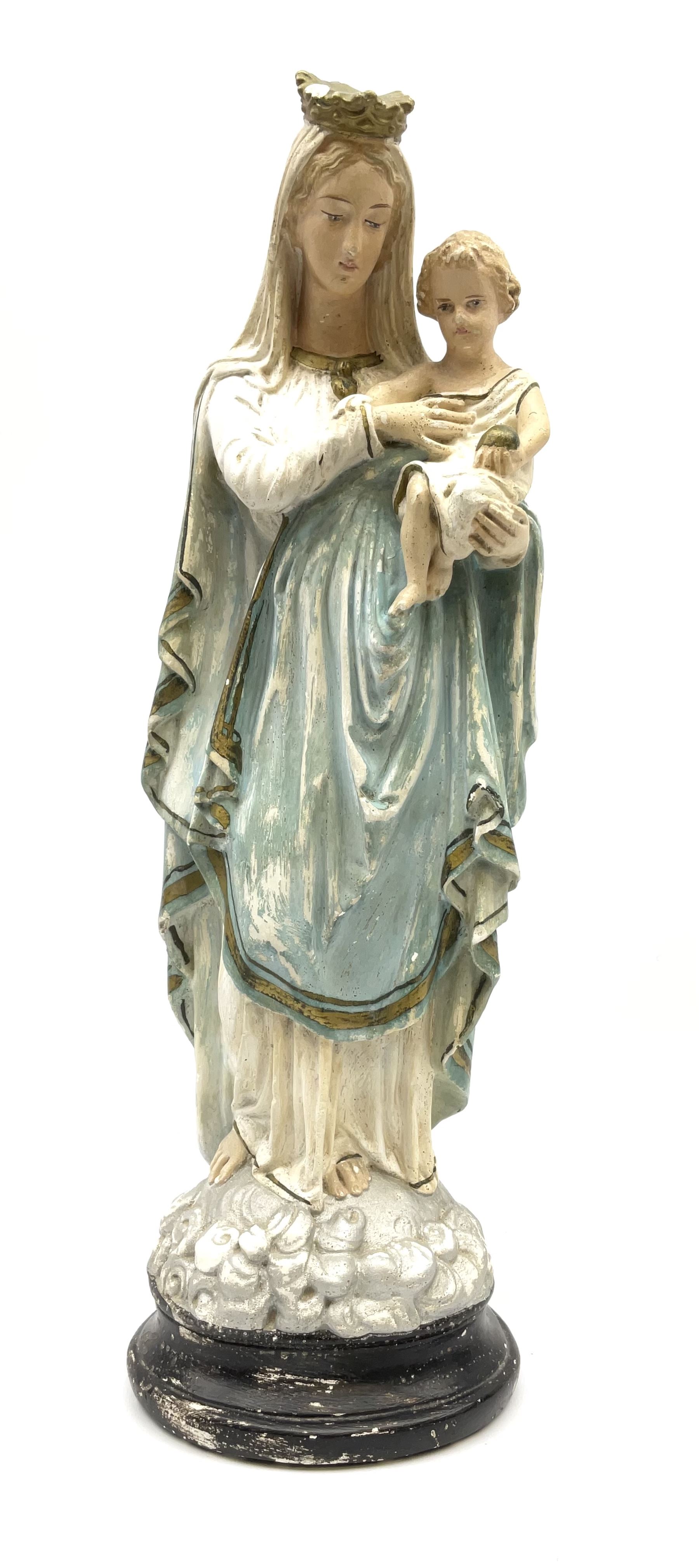An early 20th century painted plaster figure modelled as Madonna and ...