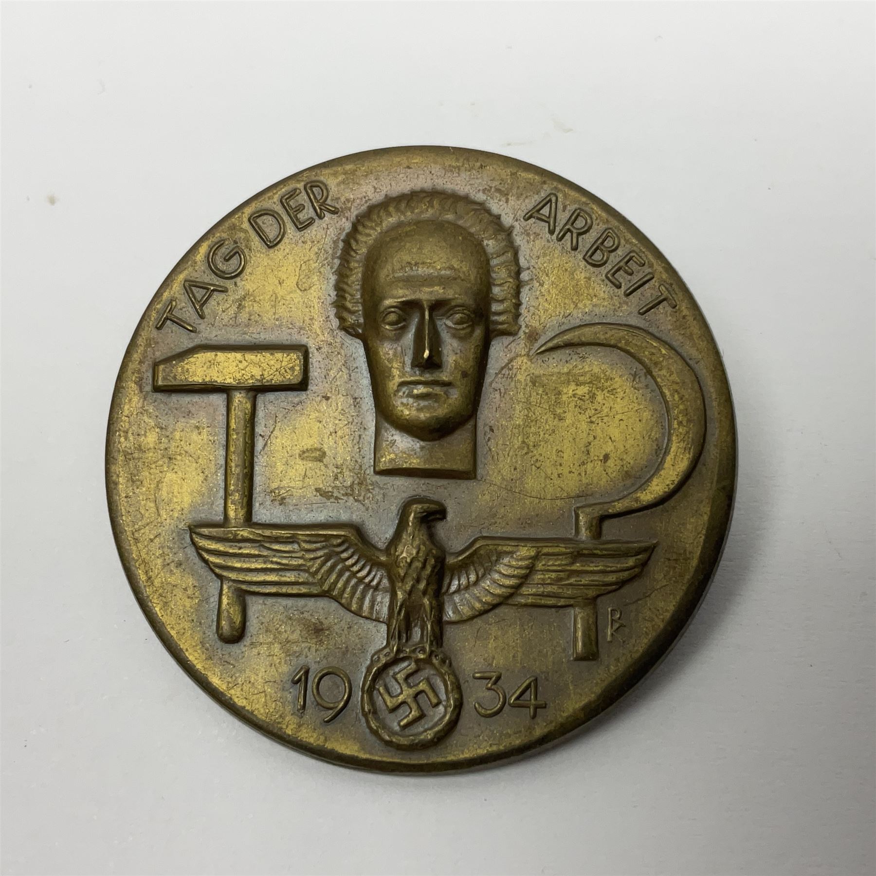 WWII German Iron Cross 2nd Class with ribbon; WWI German Wuerttemberg Medal with ribbon; and Day Badge for 1934 marked Reichsverband Pforzheim32 (3)