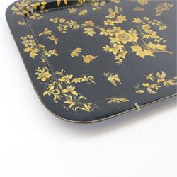 Large 19th century black lacquered papier-mâché tray, of rounded rectangular form, painted in gilt with floral sprays and butterflies, W77cm D58.5cm