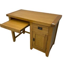 Light oak single pedestal desk, fitted with cupboard and drawer