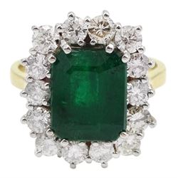 18ct gold emerald and round brilliant cut diamond cluster ring, hallmarked, emerald approx 3.70 carat, total diamond weight approx 1.40 carat
