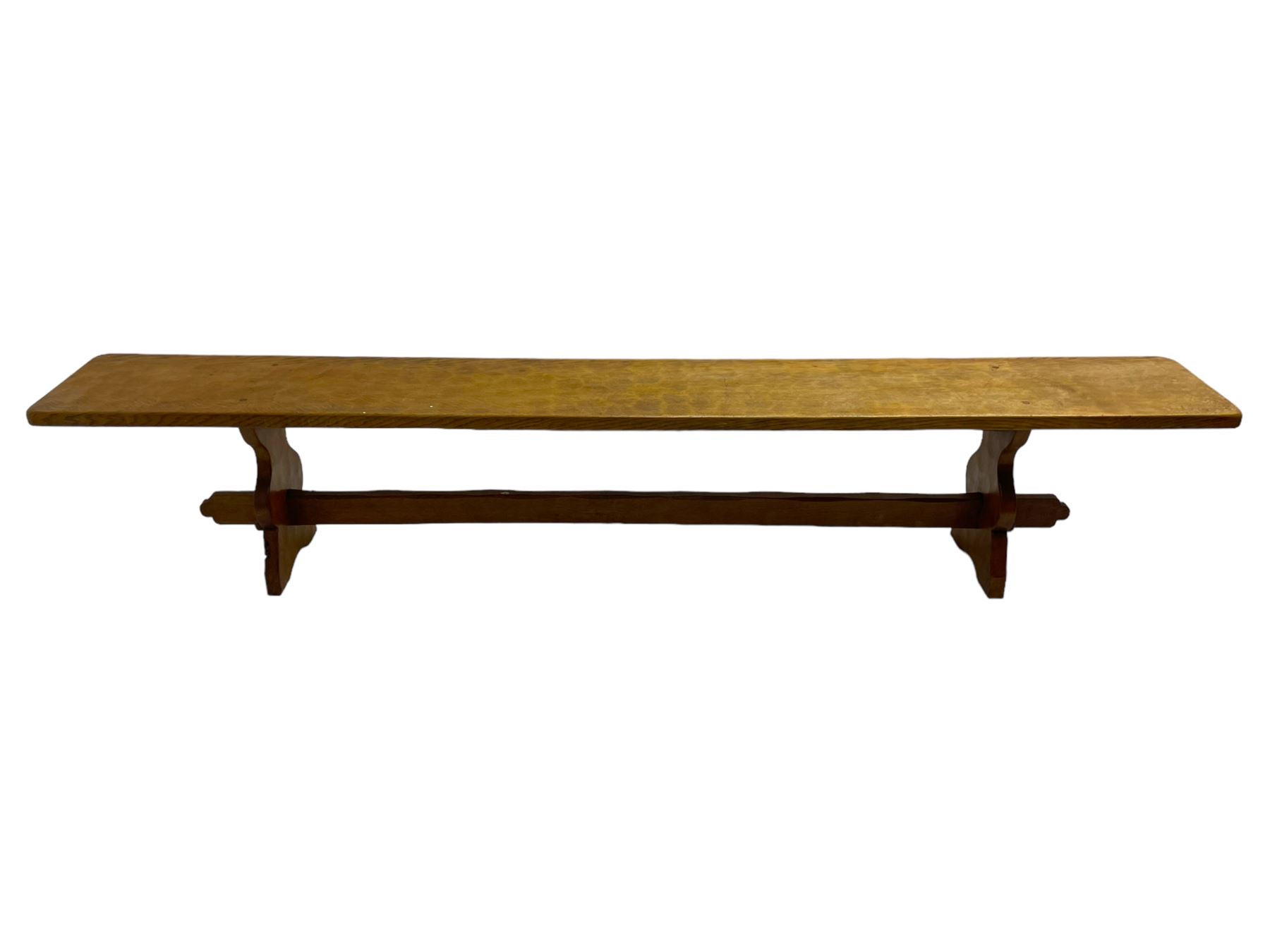 Gnomeman - adzed oak narrow bench, rectangular seat on shaped end supports united by pegged stretcher, carved with gnome signature, by Thomas Whittaker, Little Beck 