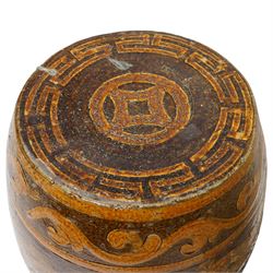 Chinese famille rose garden seat, together with a further terracotta example, H51cm and 49cm (2)