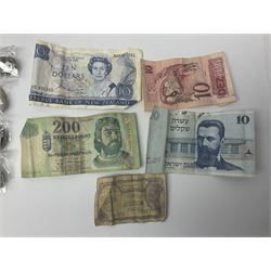Great British and World coin and banknotes, including approximately 85 grams of pre 1947 silver coins, Queen Elizabeth II 2002 five pound coin, United States of America 1897 five cents, King George V East Africa 1922 one shilling, King George VI South Africa 1952 two and a half shillings etc, Reserve Bank of New Zealand ten dollars banknote 'NVD 405261', United States of America one dollar notes etc