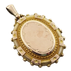  Victorian gold and diamond locket, with engraved flower decoration   