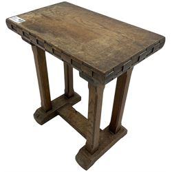 Yorkshire oak - small oak occasional table, rectangular top with carved checkered edge, on four stop chamfered pillar supports, sledge feet united by stretchers, carved with butterfly signature 