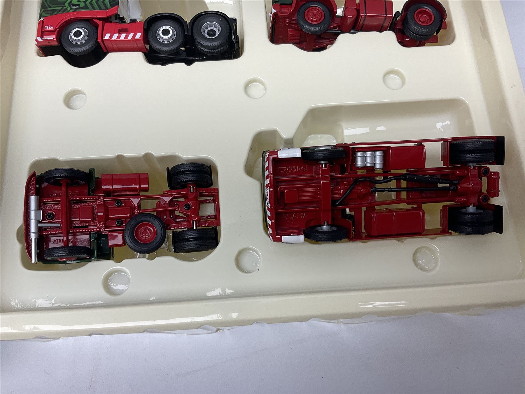 Corgi Eddie Stobart - two limited edition Hauliers of Renown sets; CC99203 Edward Stobart 1954-2011 Commemorative Set; and CC99202 1970-2010 40th Anniversary Set; both boxed (2)