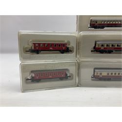 Marklin mini-club 'Z' gauge - twelve passenger coaches nos.8610, two 8611, 8613, 8700, two 8701, 8720, 8721, 8722, 8723 and 8725; together with four others in two unassociated boxes; all in hard plastic boxes (16)