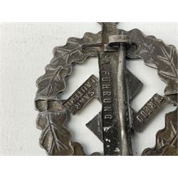 Two WW2 German Sports badges - SA sports badge marked verso 'W.Redo Eigentum D. Obersten SA. Fuhrung Saar Lautern'; and DRL sports badge marked verso 'Wernstein Jena D.R.G.M. 35269' (2)