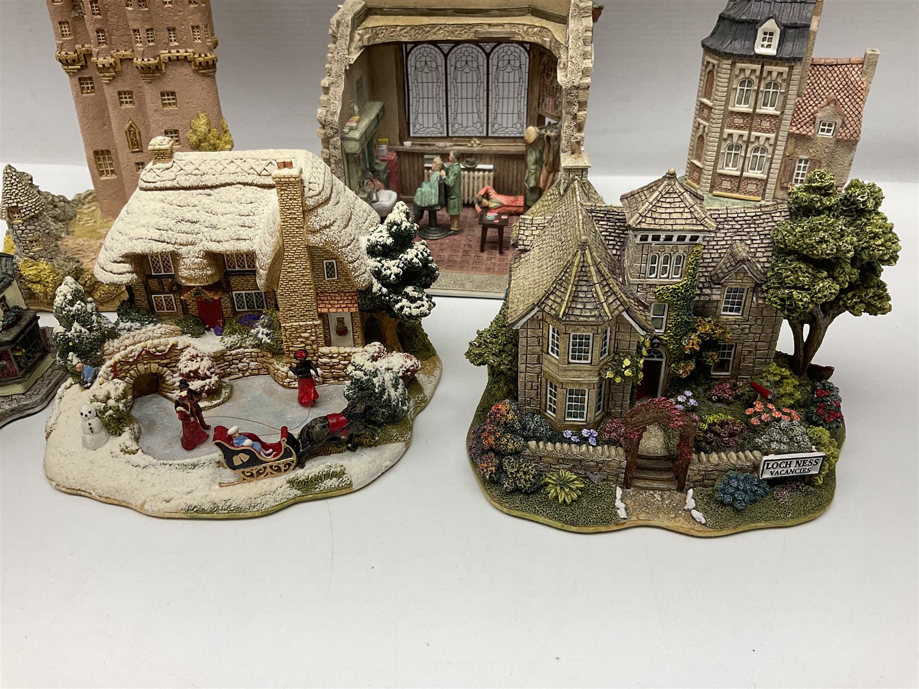 Ten Lilliput Lanes, to include Sleigh Bells, Short Back and Sides, Crook Hall Gardens, Loch Ness Lodge, Le Petit, etc, nine with original boxes  (10)