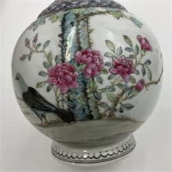 Pair of Chinese Republic porcelain vases, each painted in Famille Rose enamels with pairs of pigeons amidst peony, rock, flowering plants and leafy branches, possibly Qianlong seal beneath, H22cm 