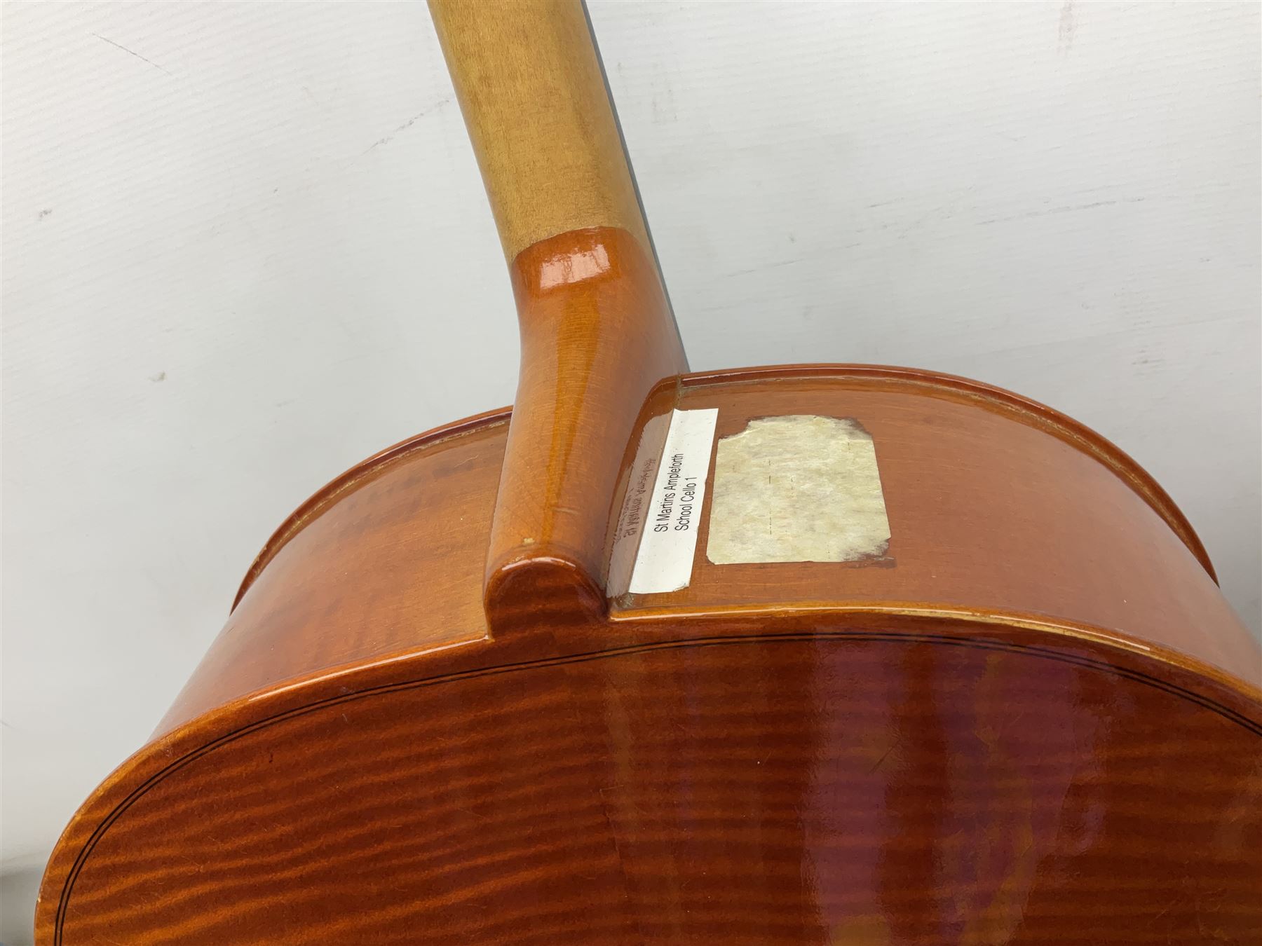 Modern Hungarian half-size cello with 69cm two-piece maple back and ribs and spruce top L114cm overall; and Stentor half size cello bearing label 'The Stentor Student II'; each in soft carrying case (2)