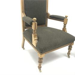  Pair of Victorian walnut salon chairs (1+1), upholstered in green wool, turned supports on castors, W64cm  