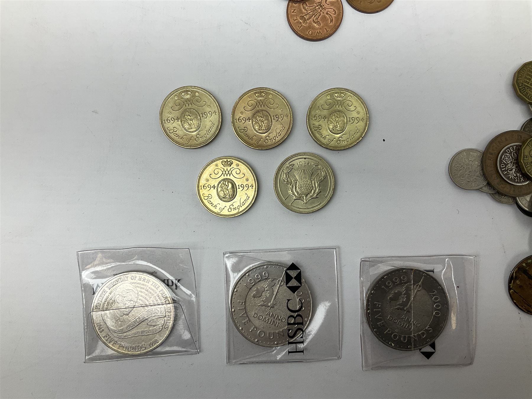Queen Victoria 1875 and 1880 half crown coin, small number of pre 1947 Great British silver coins, three Queen Elizabeth II five pound coins, five two pounds, pre-decimal coins including pennies, brass threepence pieces etc