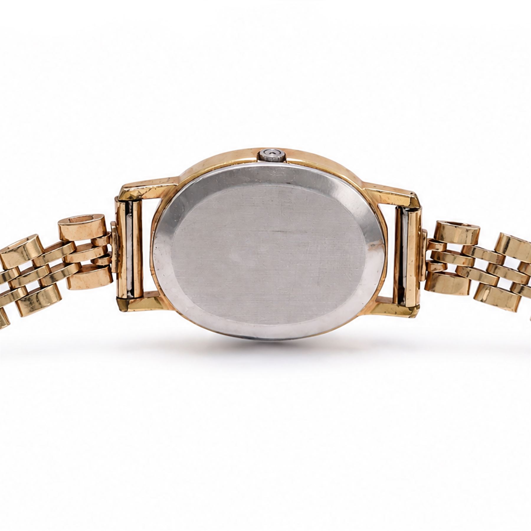 Omega ladies gold-plated quartz wristwatch, gilt dial with baton hour markers, on 9ct gold bracelet, Birmingham 1977, boxed with original leather strap