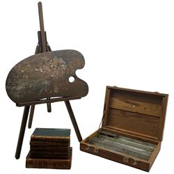 John Harold Wood (British ?-c1965): The artist's easel, palette, paint box, and six books on painting (9) 
Provenance: by direct descent through the artist's family. Wood had a cottage in Robin Hood's Bay, and his sister married Staithes Group artist Percy Morton Teasdale (1870-1961).