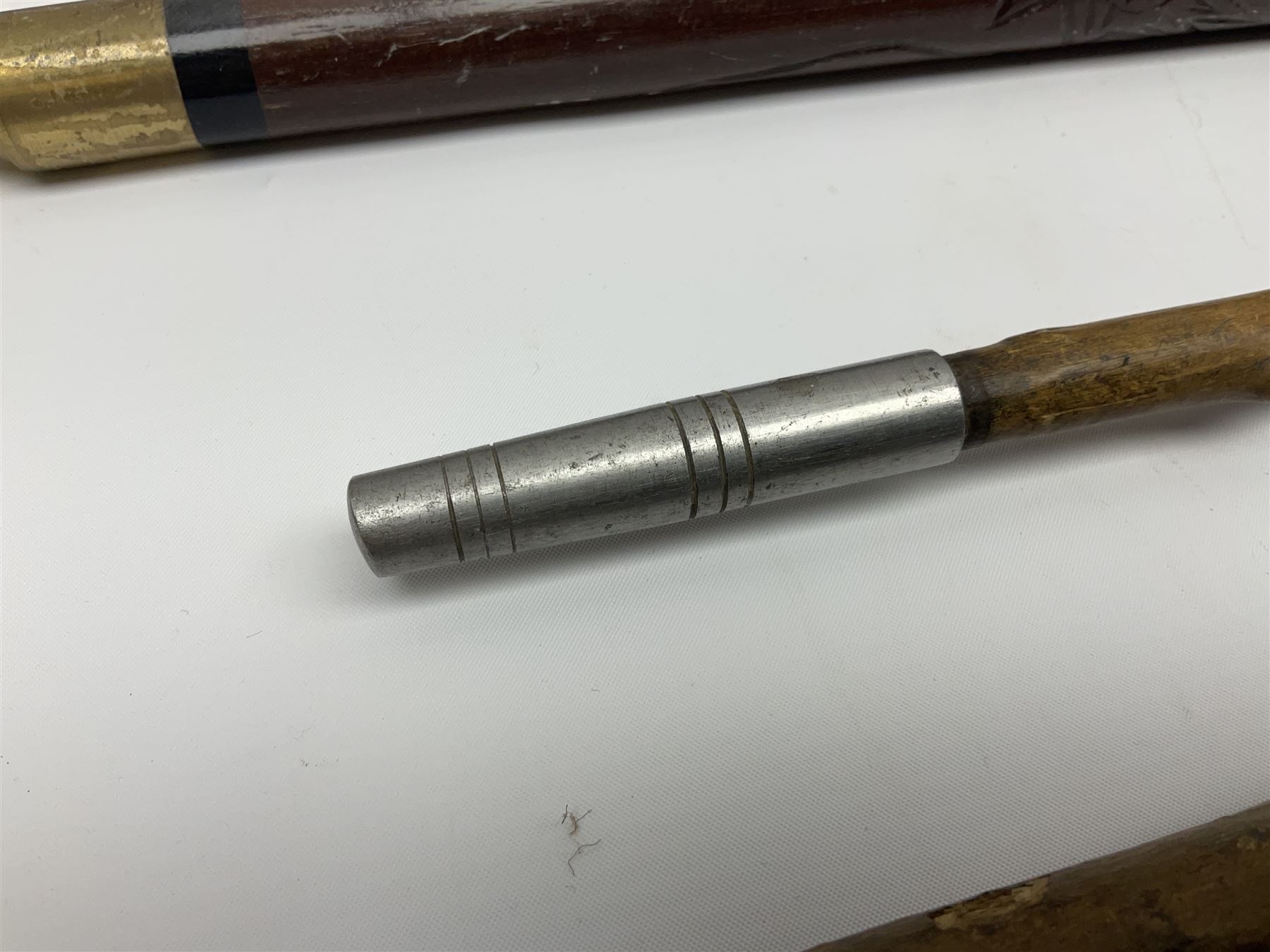 Four wooden walking canes, including a carved mahogany snooker cue example, tallest H86cm