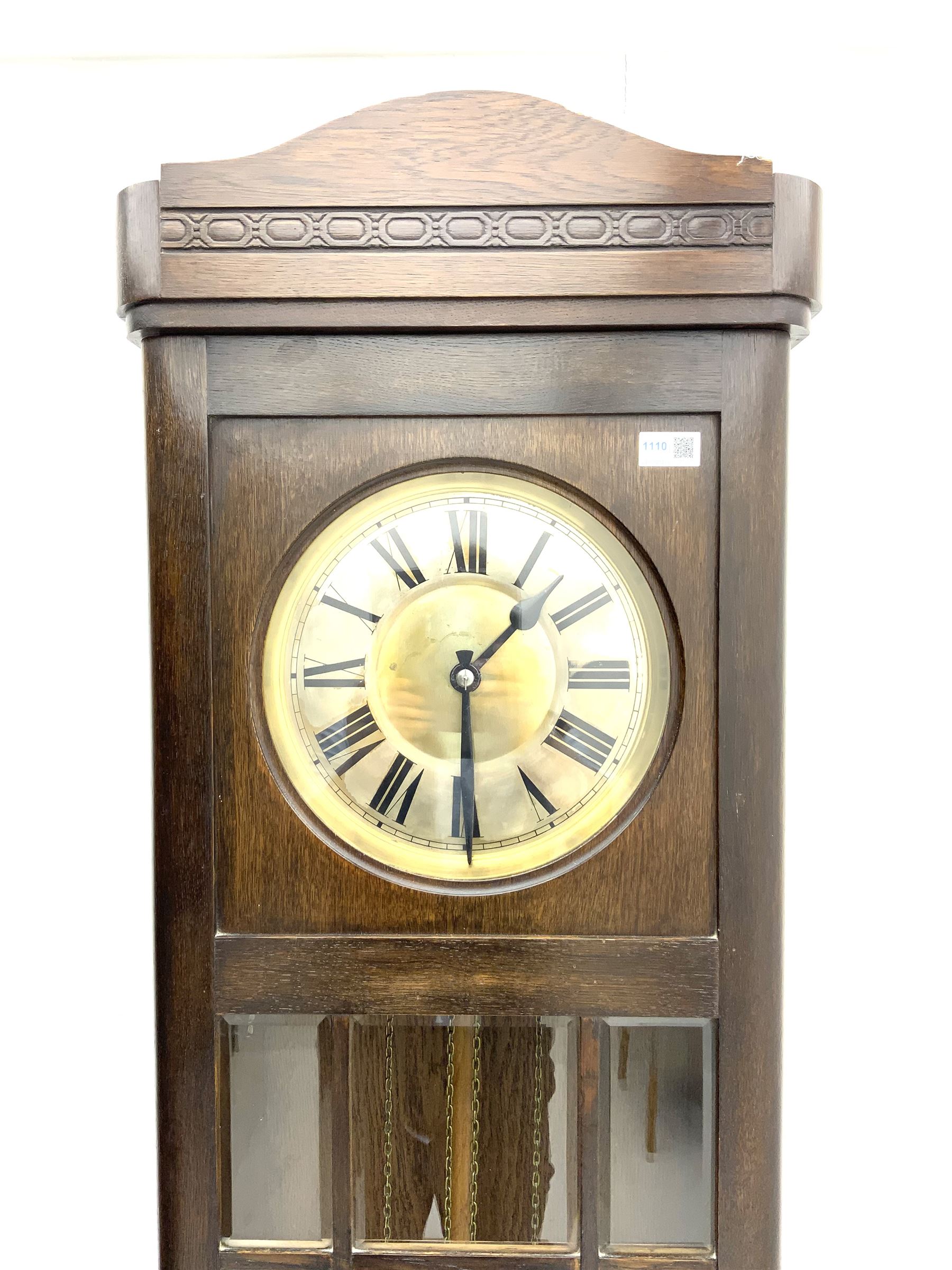 Early 20th century oak longcase clock, brass weight driven, bevelled glass viewing panes
