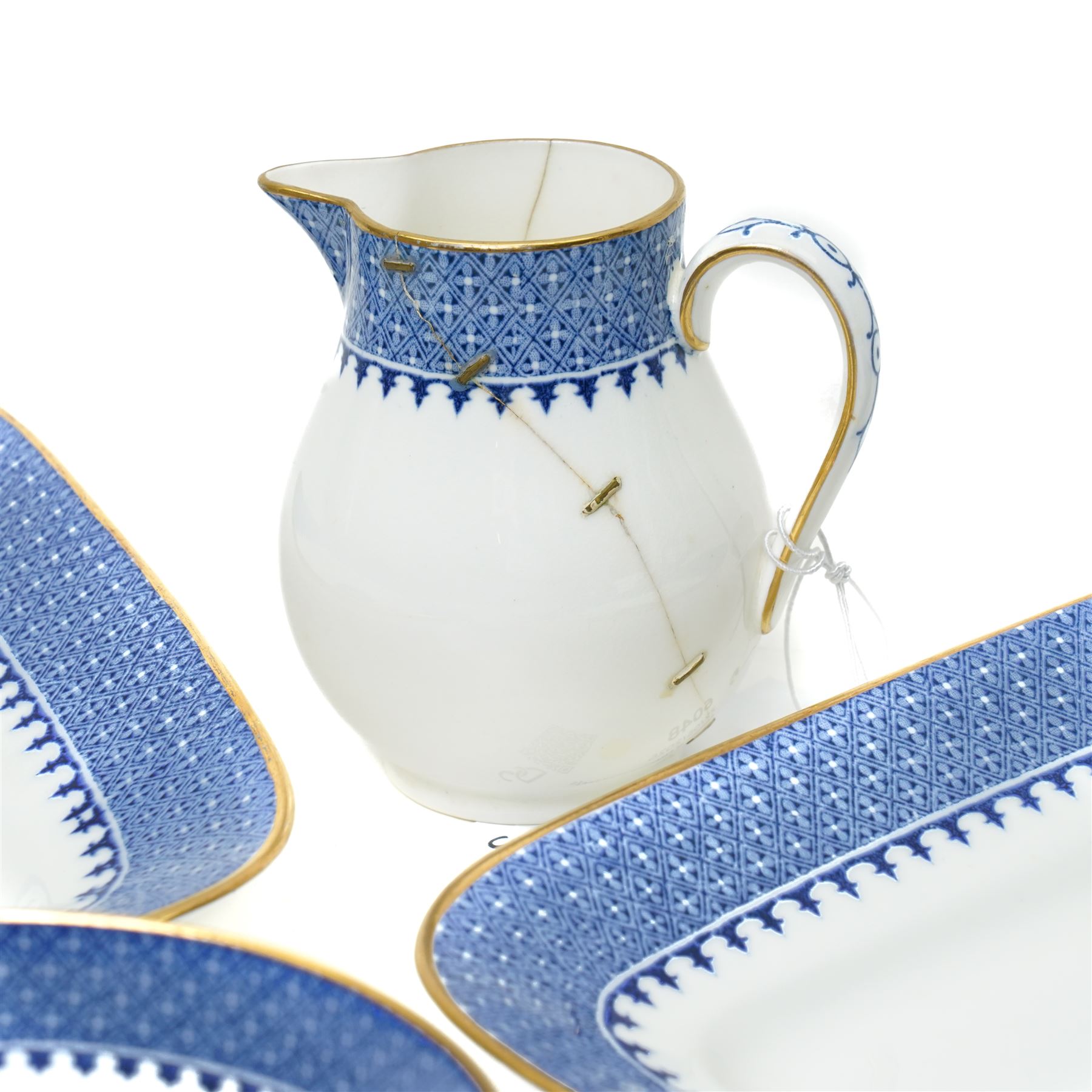 Wedgwood Lynn pattern blue and white tea service comprising eleven cups and saucers, twelve plates, milk jug, sugar bowl and two bread and butter plates