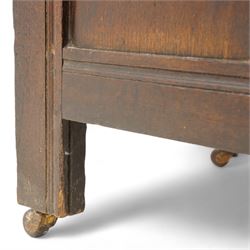 18th century oak blanket box, moulded rectangular hinged lid over lunette carved frieze rail and panelled front, moulded frame and panelled sides fitted with carrying handles, on stile supports