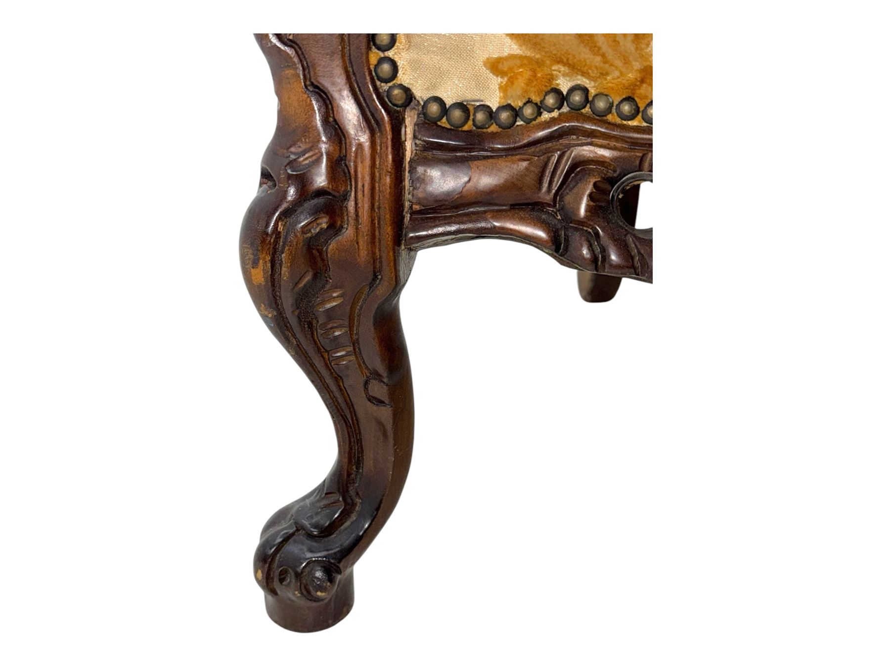 Victorian design stained wood three seater settee, top rail carved and scrolled, padded back and arms, scrolled cabriole feet 