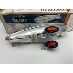 Schylling - six tinplate models comprising Sir Ian’s Bluebird racing car, Speedway Auto Racer, two Aluminium Airships, Tin Speedboat and Ernest in the Music Box; all in original boxes 