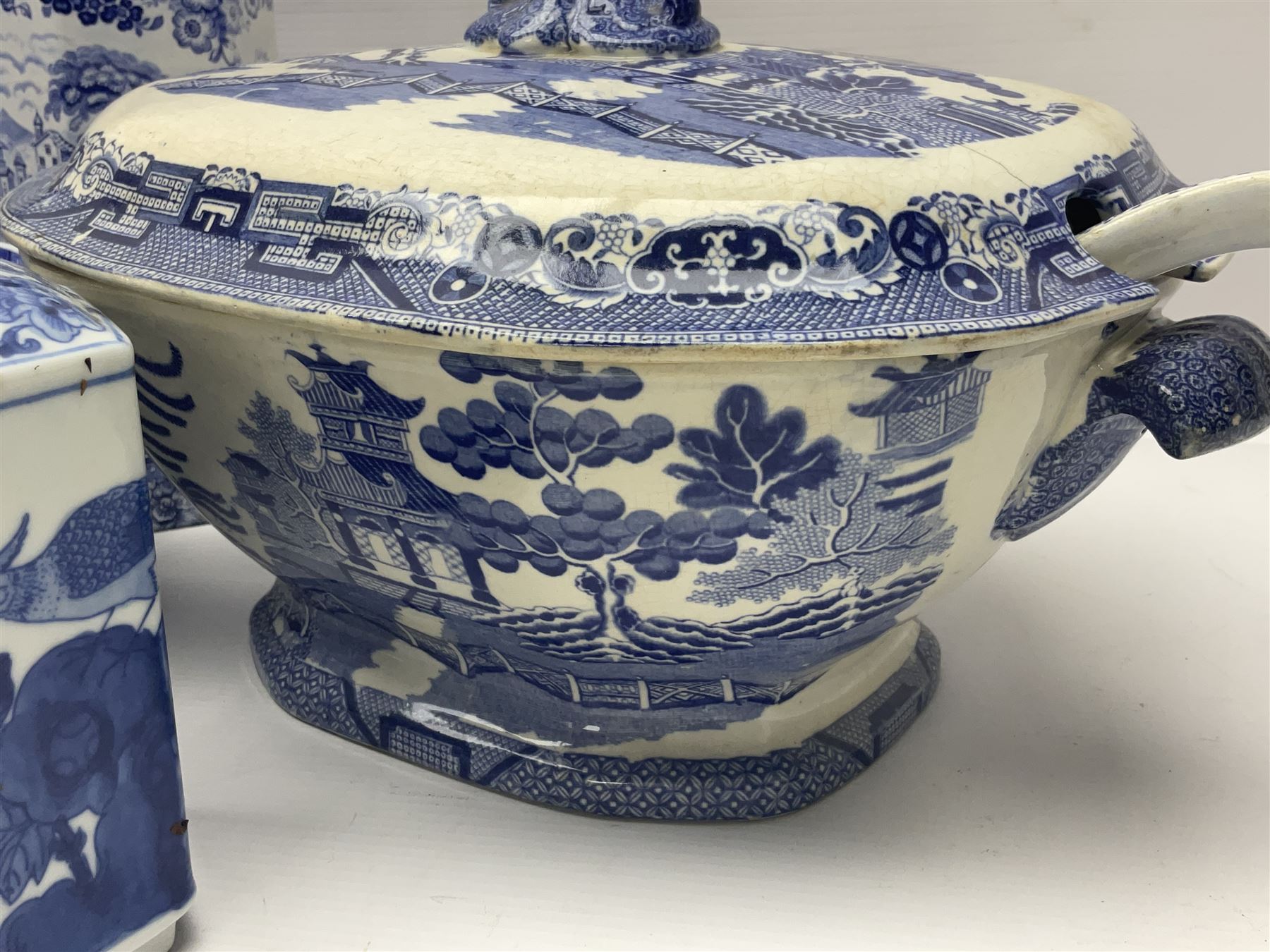 Large blue and white twin handled tureen with cover, Copeland Spode bowl, oriental blue and white jar and cover and a pair of blue and white vases