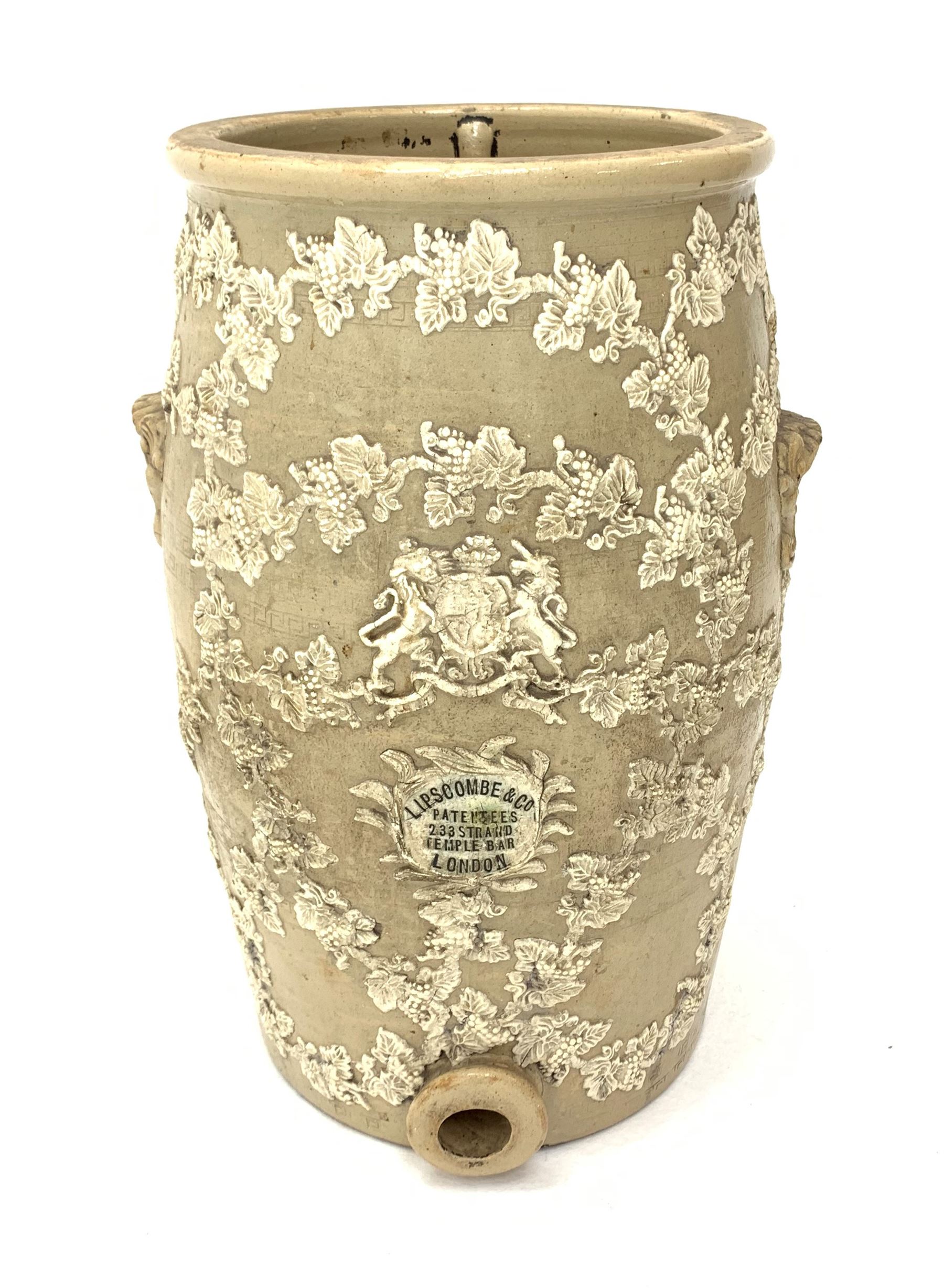 A Victorian Lipscombe & Co stoneware water filter, the body with twin scrolled lug handles, and applied fruiting vine decoration to the front, with applied maker's plaque detailed Lipscombe & Co Patentees 233 Strand Temple Bar London, H54cm. 
