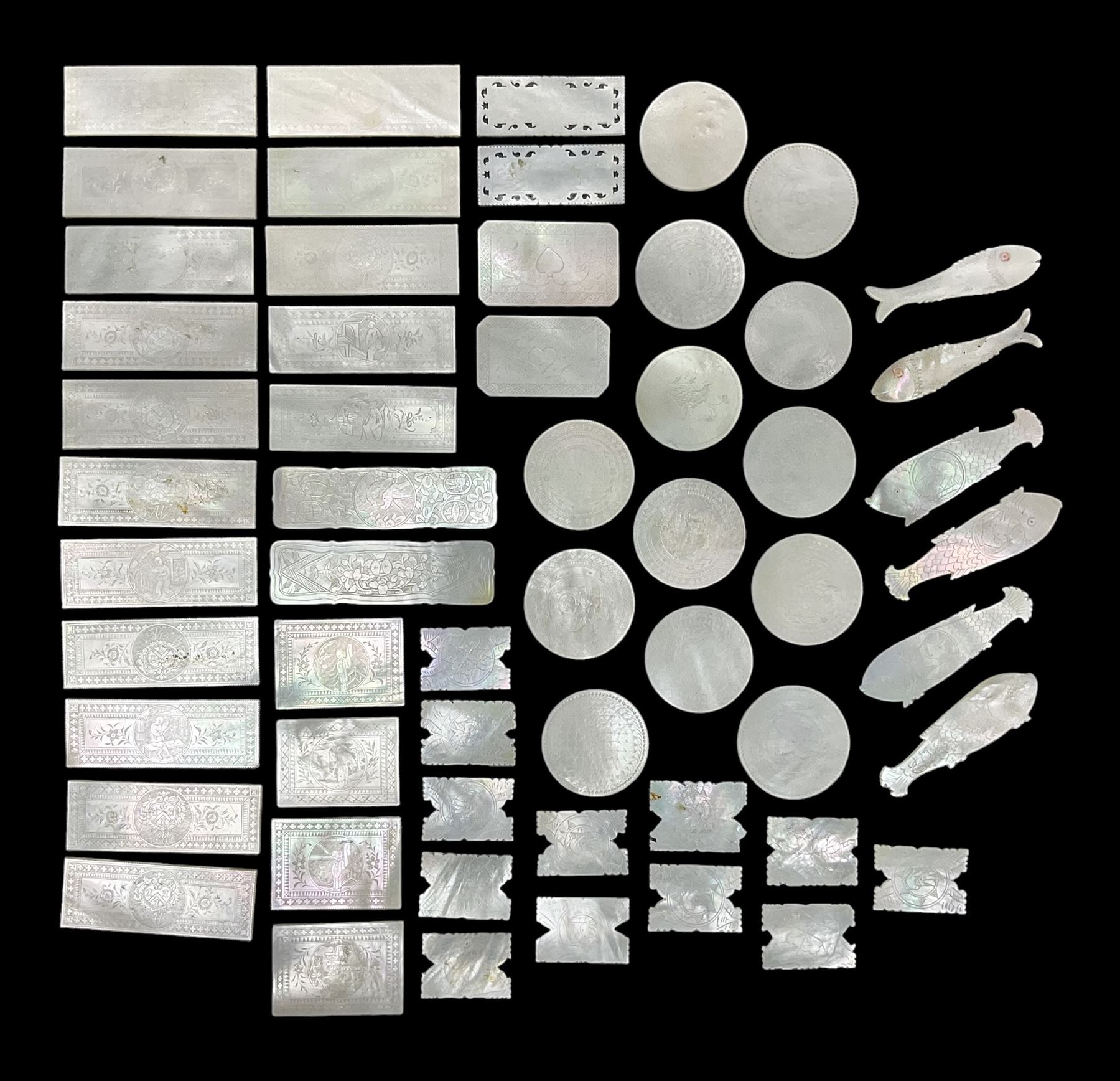 Collection of fifty seven Chinese mother of pearl gaming counters or tokens, of various size and form including rectangular, circular and fish shaped examples, various decoration including floral motifs, largest rectangular examples L6cm