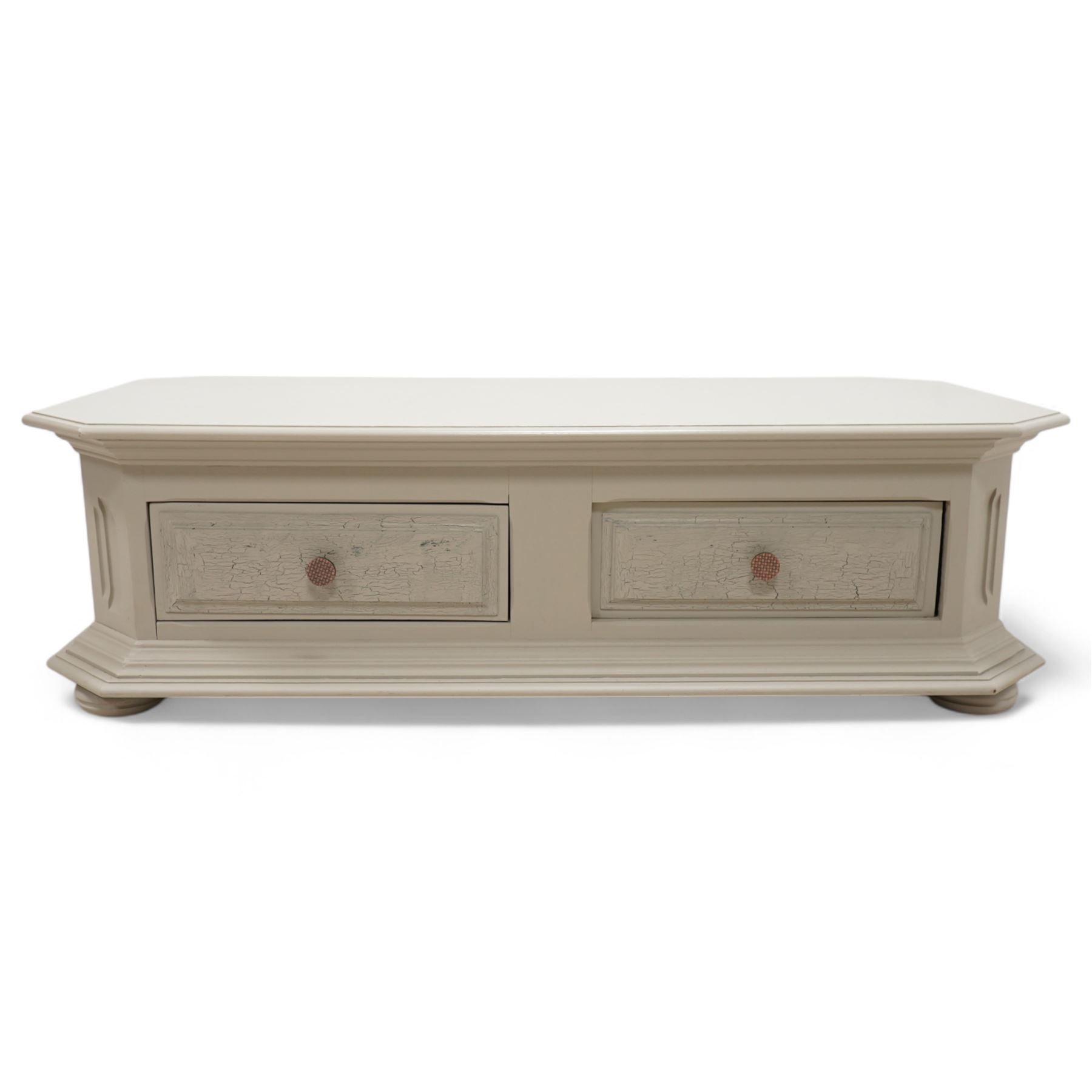 Light grey painted low coffee table, canted rectangular form fitted with two through drawers, on compressed bun feet