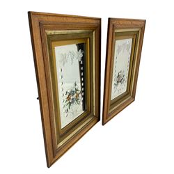 Pair of early 20th century wall mirrors, etched and bevelled plates painted with flowers, in moulded oak frames