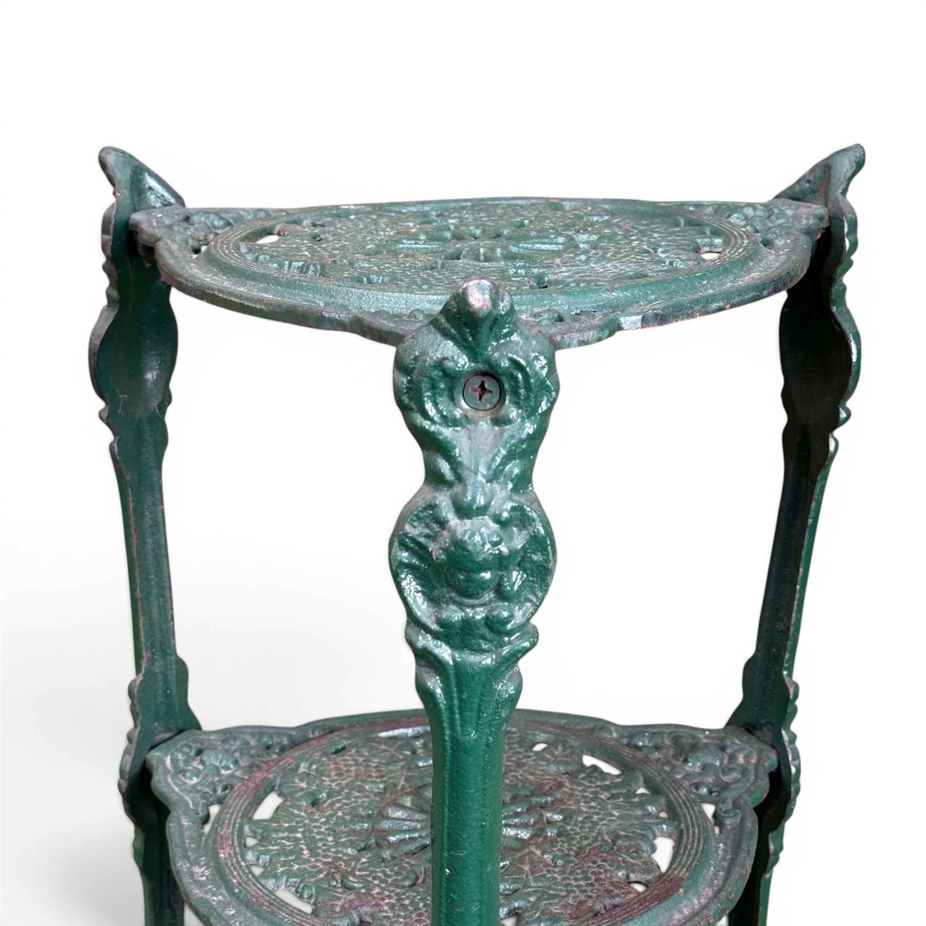 Ornate cast iron three tier garden plant or pan stand, green painted finish