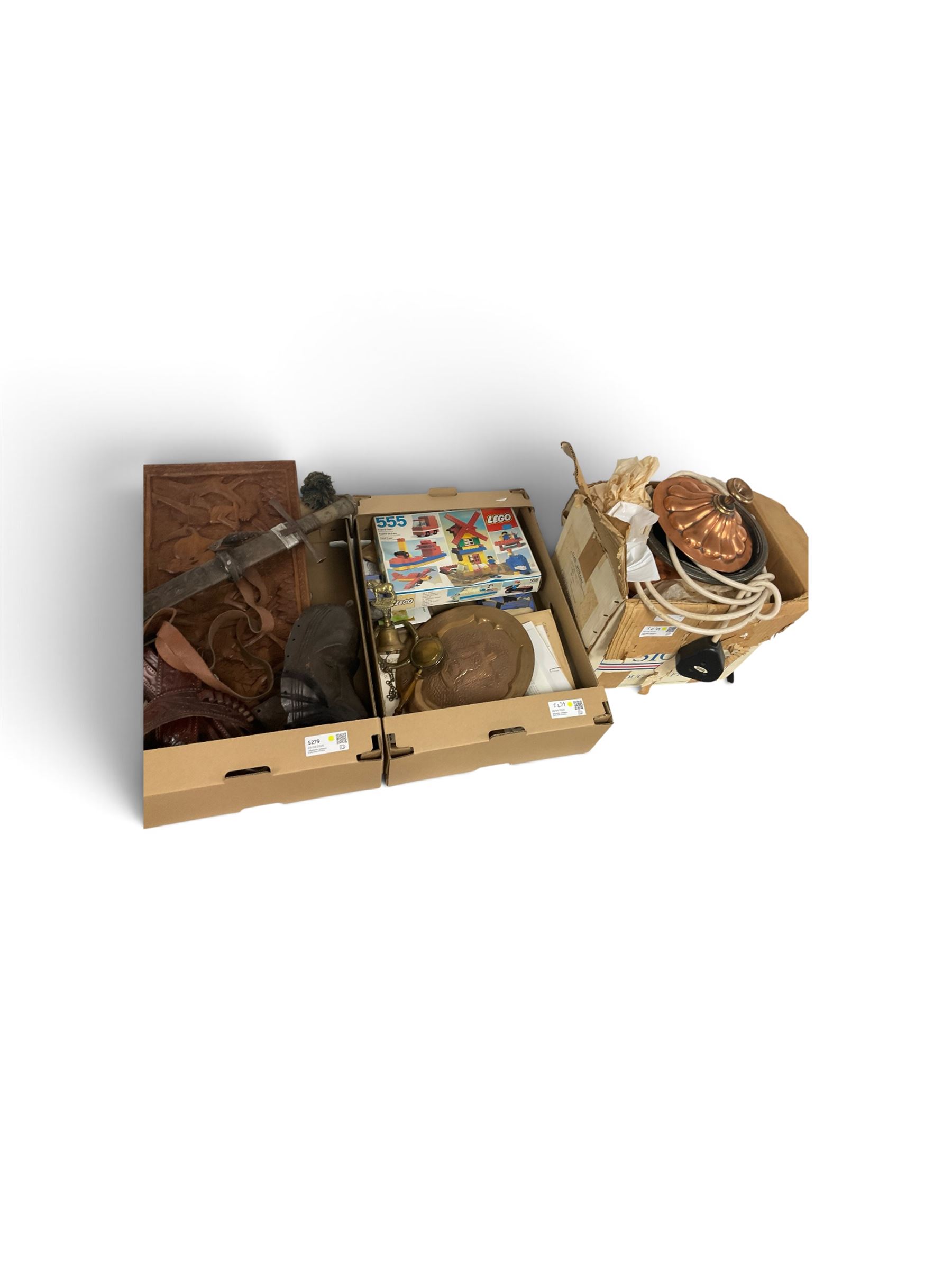 Cased display of miniature musical instruments, together with wooden carvings and other items, in four boxes  