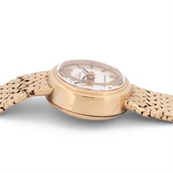 Omega Ladymatic 9ct gold automatic wristwatch, Cal. 661, silvered dial with baton hour markers, on integral 9ct gold bracelet, Birmingham 1968