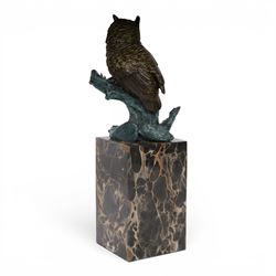 Cold painted bronze figure, modelled as an owl perched upon a tree stump signed Milo and with foundry mark, raised upon black veined marble plinth, H27.5cm