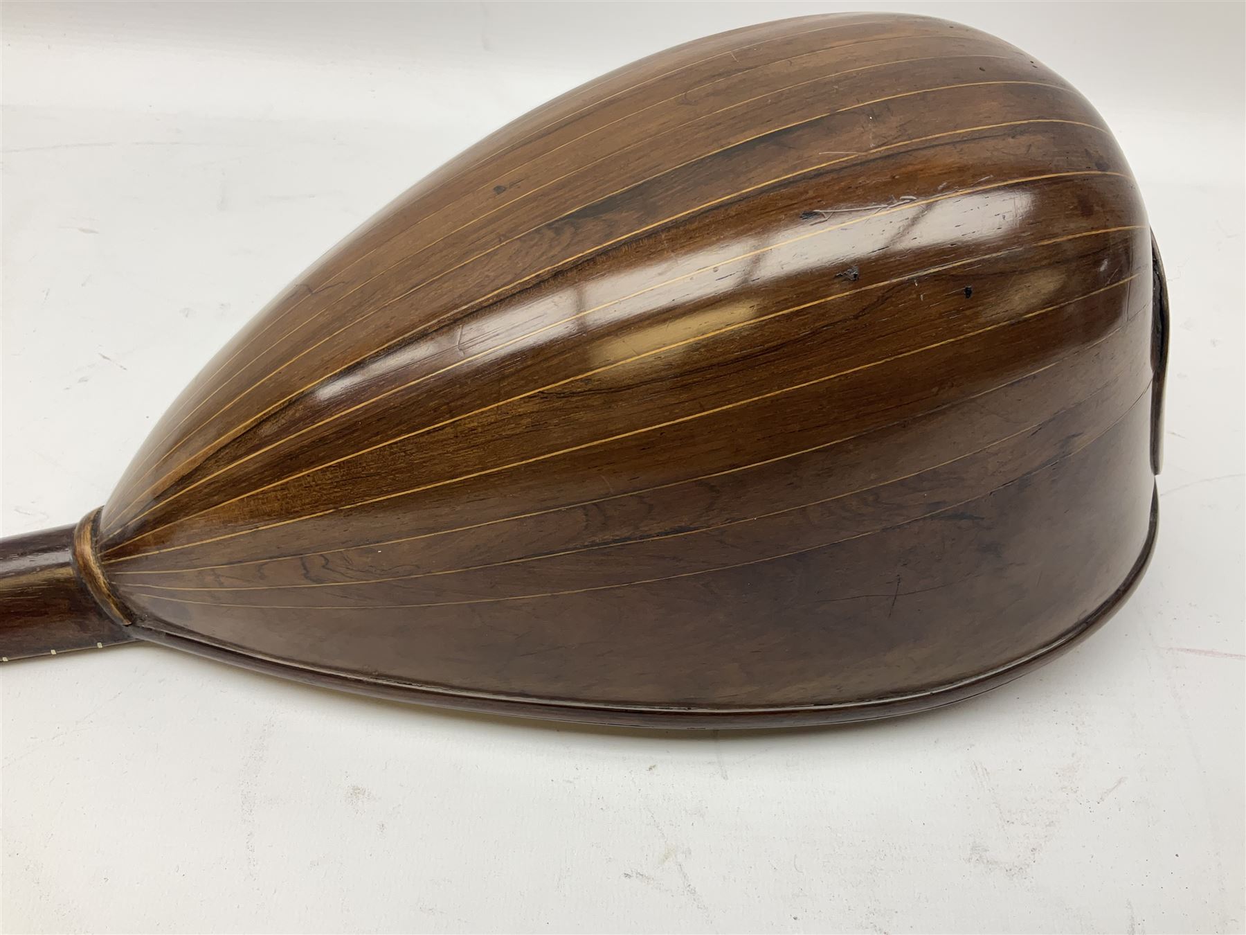 Italian mandolin, with foliate inlaid scratchplate, paper label inscribed 'Carlo Loveri & Figlio of Napoli', L62cm