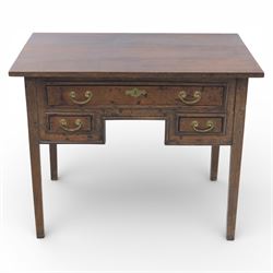 18th century oak lowboy, the rectangular top above an arrangement of three drawers with brass swan neck handles and shaped backplates, the drawers with fielded fronts, raised upon square tapering legs 