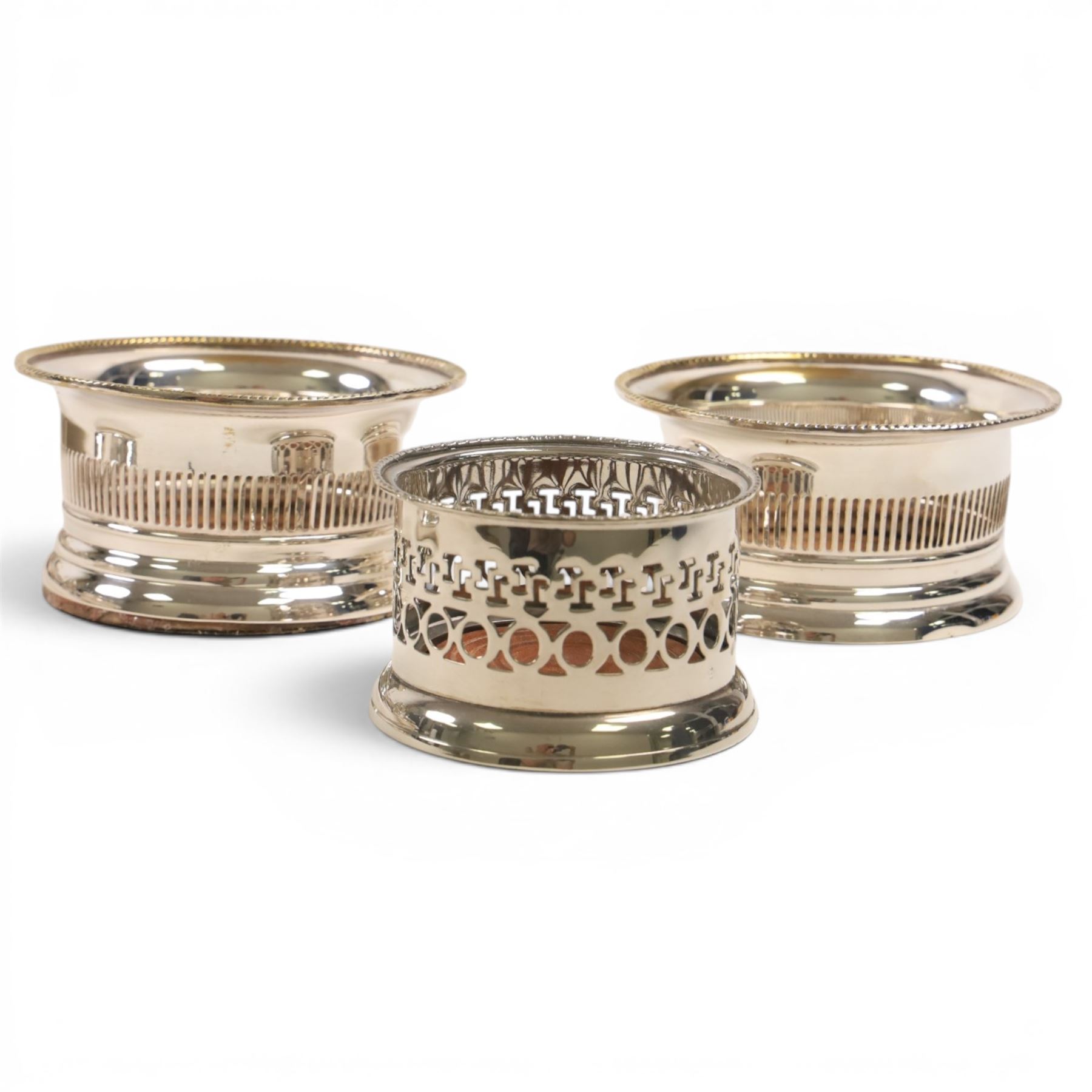 Set of twelve silver plate place holders, with grapes to the front, together with three bottle holders, butlers tray etc