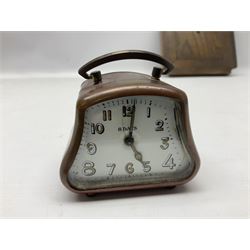 Smiths barometer in carved and stepped oak square case, together with a small copper 8 days clock with bevelled glass plate