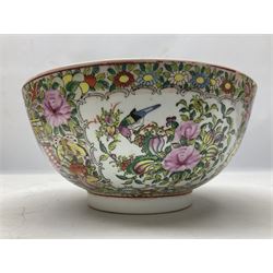 Two Chinese Famille Rose bowls, one decorated with figures in garden scene to the centre, and decorated with blossoming flowers, both with character seal mark beneath