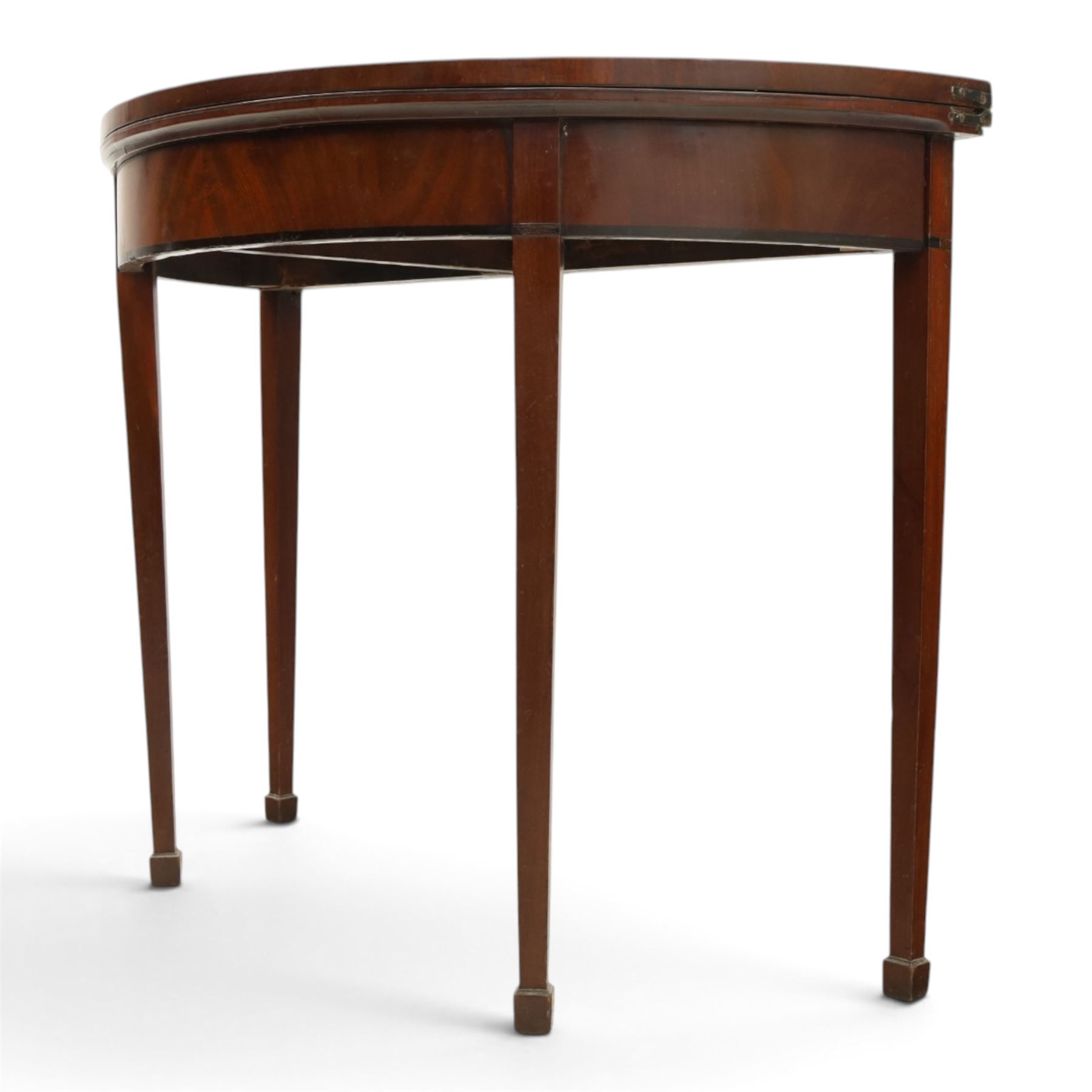 Edwardian mahogany inlaid demi-lune side table, inlaid top with shell motif, green baize interior, with gateleg, raised on square tapering supports terminating in spade feet