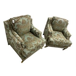 Wade - pair 'Kempston' armchairs, upholstered in chenille fabric with brocade pattern, raised on mahogany finish square tapering block feet with heavy brass castors